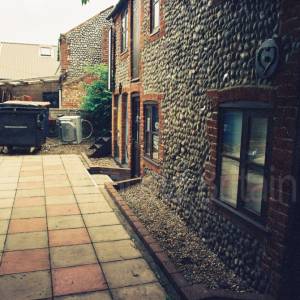 “taken before 2009  in the museum’s former location within converted fisherman’s cottages in the town centre”