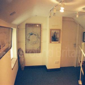 “taken before 2009  in the museum’s former location within converted fisherman’s cottages in the town centre”