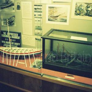 “taken before 2009  in the museum’s former location within converted fisherman’s cottages in the town centre”