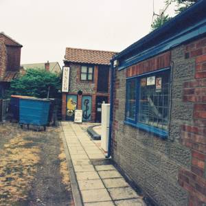 “taken before 2009  in the museum’s former location within converted fisherman’s cottages in the town centre”
